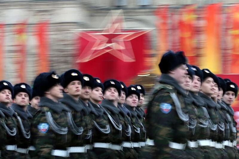 Russian soldiers march during a military parade to mark the 72nd anniversary of an historical parade in 1941 when Soviet soldiers marched through the Red Square to the front lines of World War II.  Maxim Shipenkov / EPA