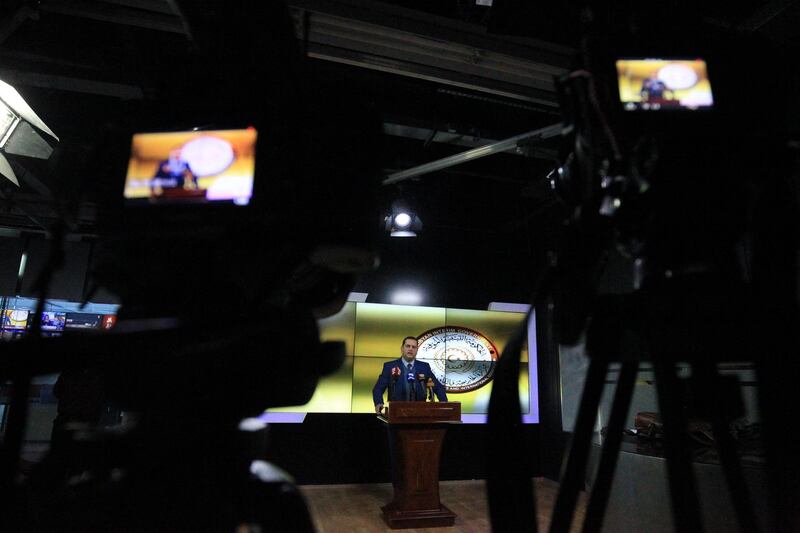 Libya's parallel eastern government foreign minister, Abdulhadi Lahweej, addresses the media in Benghazi. AFP