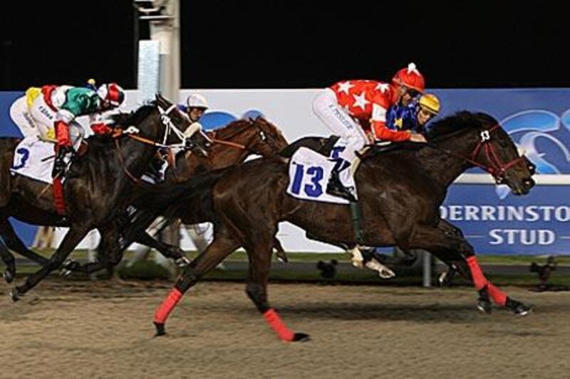 Red Desire, No 13, strides to victory in the  Al Maktoum Challenge Round III on March 4.