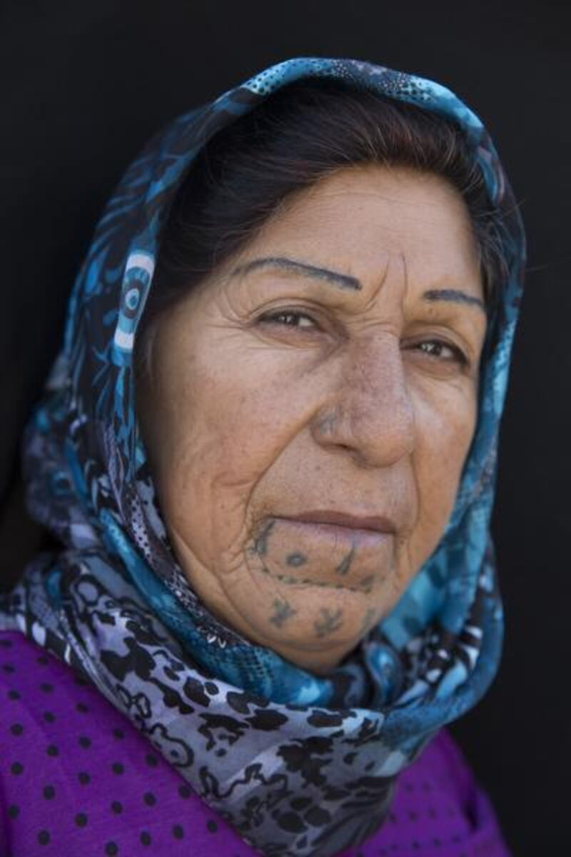 Noyle Muzlem, 55 from El Ajak village of Kobani. ‘It’s an old tradition. I don’t really like my tattoos.’