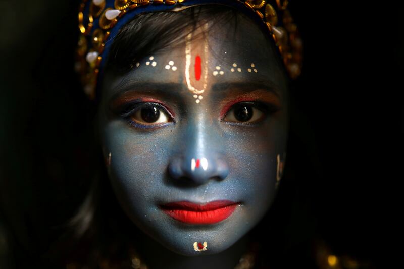 A child dressed as Hindu Lord Krishna poses during the festival of Janmashtami, marking the birth of Hindu Lord Krishna, in Dhaka, Bangladesh, August 23, 2019. REUTERS/Mohammad Ponir Hossain     TPX IMAGES OF THE DAY