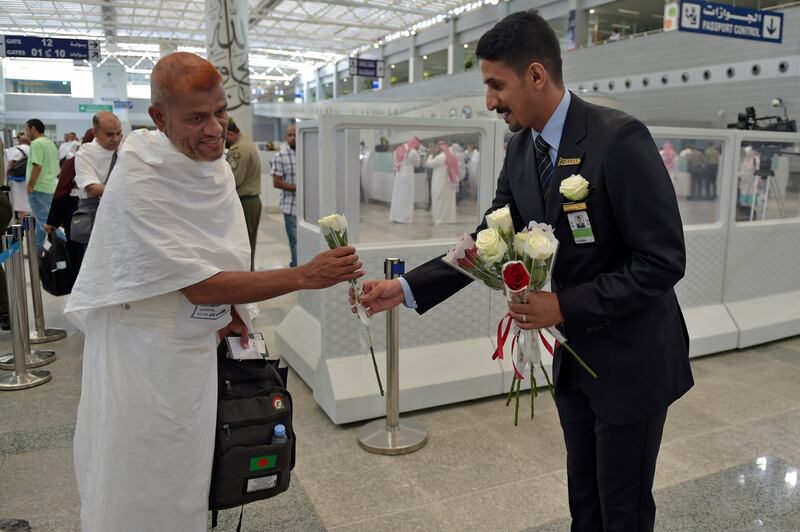 Hajj employees welcome pilgrims at King Abdulaziz International Airport in Jeddah. AFP