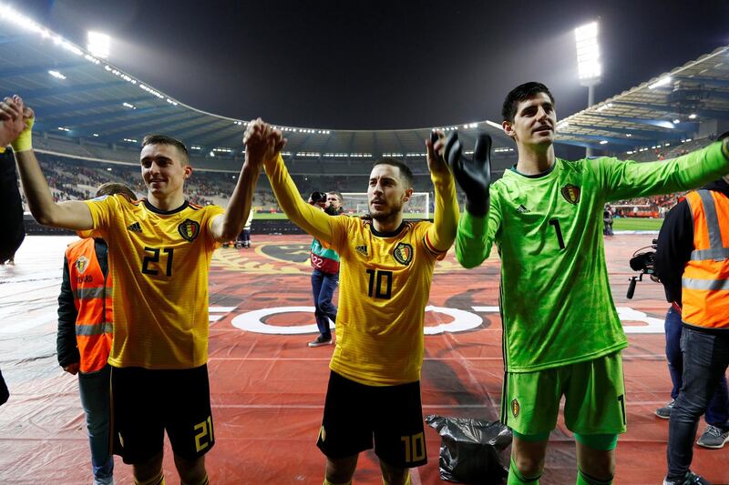 Belgium's Timothy Castagne, Eden Hazard and Thibaut Courtois celebrate after the match against Russia at King Baudouin Stadium, Brussels, Belgium. Reuters