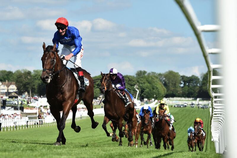 Jockey Adam Kirby guides Adayar to victory in the Derby at Epsom Downs Racecourse in England, on Saturday June 5. AFP