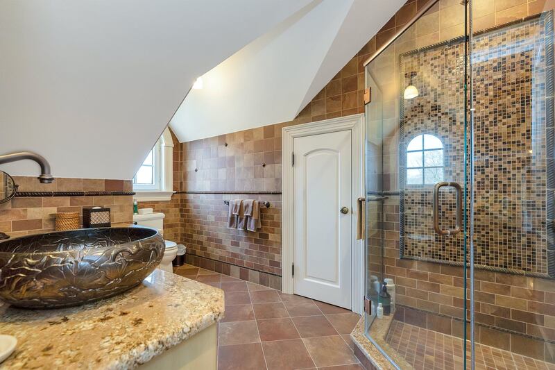 One of the seven bathrooms. Courtesy Douglas Elliman Realty