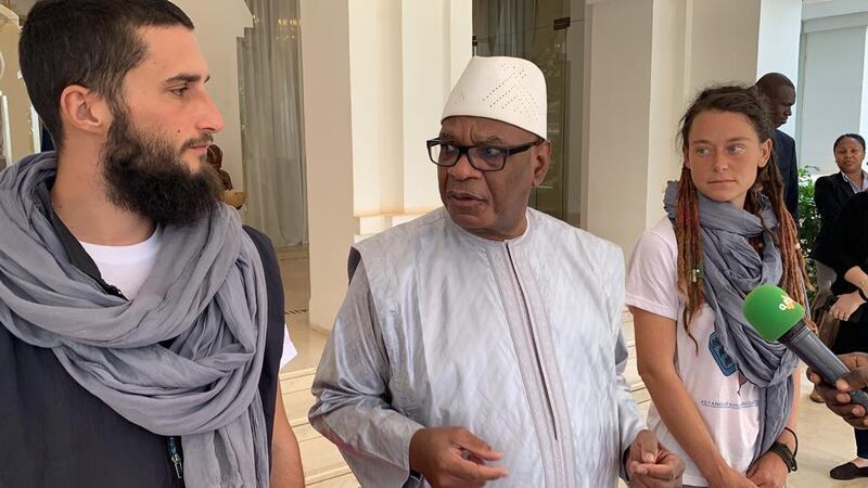 Canadian Edith Blais and Italian Luca Tachchetto meet Mali's President Ibrahim Boubacar Keita after being freed. MINUSMA, HO