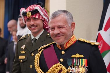 Jordan's King Abdullah II and Crown Prince Hussein arrive for the opening of the fourth session of the current parliament in  Amman. Jordanian Royal Palace / AFP