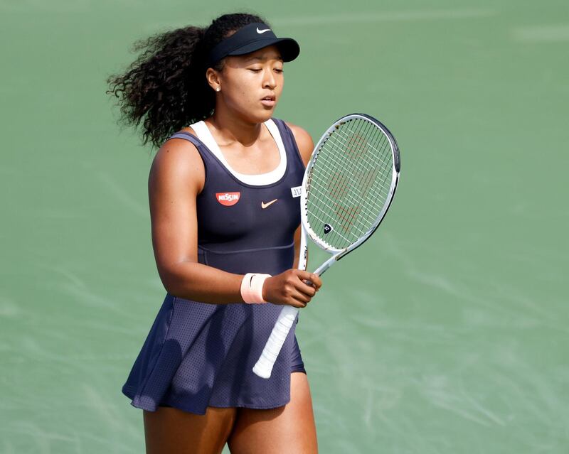 epa08628135 Naomi Osaka of Japan reacts while playing against Anett Kontaveit of Estonia during a Western and Southern Open quarter-finals match at the USTA National Tennis Center in Flushing Meadows, New York, USA, 26 August 2020. Osaka announced on 26 August that she would not compete in the Western and Southern Open semifinal match on 27 August, in protest of the police shooting of Jacob Blake in Wisconsin.  EPA/JASON SZENES