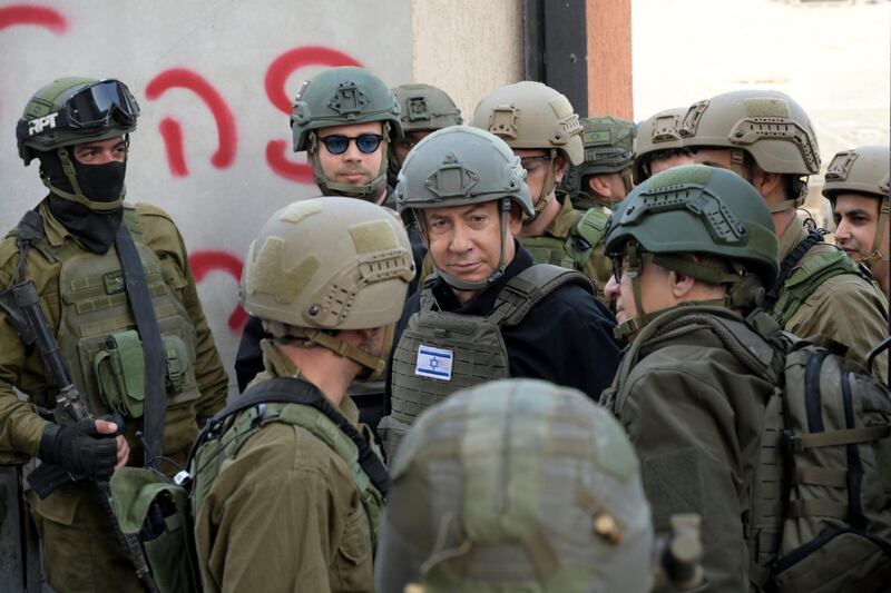Israeli Prime Minister Benjamin Netanyahu receives a security briefing with commanders and soldiers in the northern Gaza Strip. AP