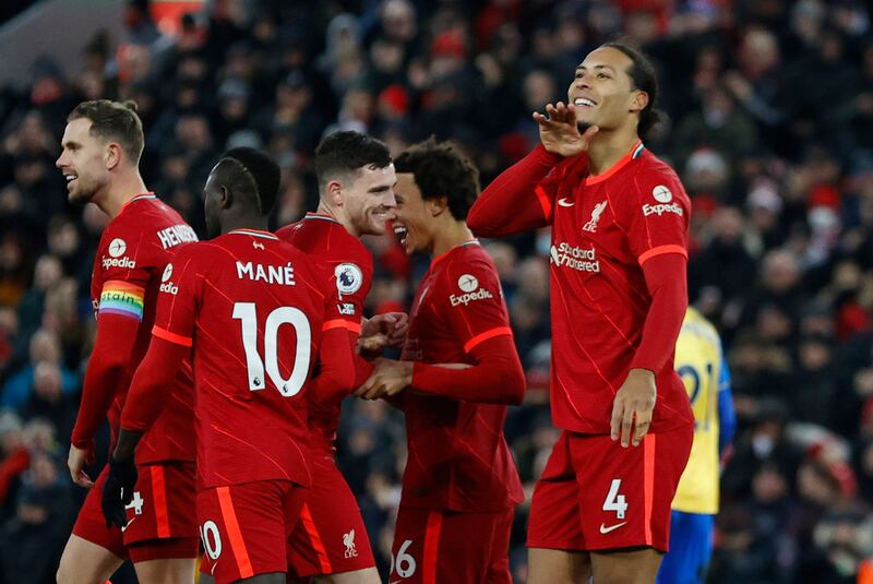 Liverpool's Virgil van Dijk celebrates scoring their fourth goal. Reuters