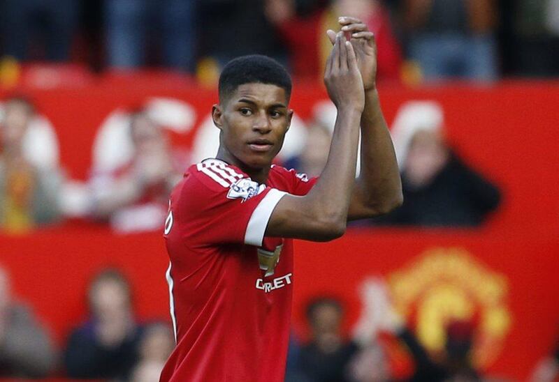 Manchester United's Marcus Rashford applauds their fans after the match against Arsenal, in which he scored two goals. Reuters / Phil Noble