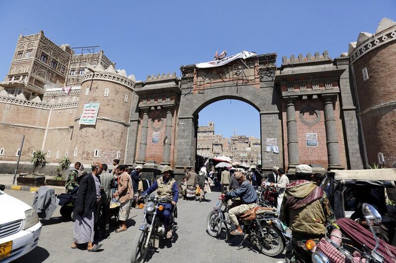 Yemenis walking through the main gate of the old city ahead of a UN-announced ceasefire, in the old city of Sanaa in Yemen on October 18, 2016. Public sector employees throughout the country have not received their September salaries from the central bank and the Houthis have resorted to asking for donations. Yahya Arhab/EPA