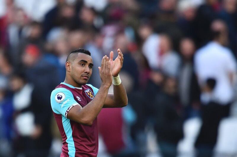 West Ham United's French midfielder Dimitri Payet applauds at the end of the English Premier League football match between West Ham United and Middlesbrough at The London Stadium, in east London on October 1, 2016. Glyn Kirk / AFP