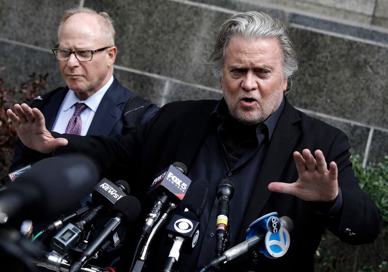 Mr Bannon at a press conference in September after he was charged with several felony counts of conspiracy, money laundering and fraud regarding his involvement in a crowdfunded border wall project scheme. EPA 