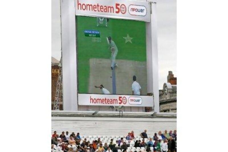 A giant screen shows the result of the DRS being used on an lbw call against England's Kevin Pietersen at a Test last year. The Indian cricket board has called for a review of the system, saying it is not reliable enough.