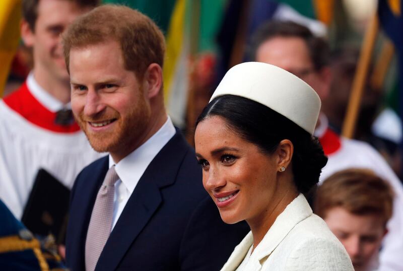 FILE - In this Monday, March 11, 2019 file photo, Britain's Prince Harry and Meghan, the Duchess of Sussex leave after the Commonwealth Service at Westminster Abbey in London. Guinness World Records said Wednesday, April 3 that a new Instagram account opened by Prince Harry and his wife Meghan is the fastest-ever to gain 1 million followers.  The account, which was opened Tuesday, reached the 1 million mark in under six hours, easily beating a record held by Korean pop sensation Kang Daniel. (AP Photo/Frank Augstein, file)