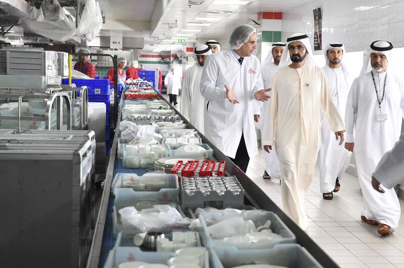 Sheikh Mohammed bin Rashid, Vice President and Ruler of Dubai, tours the automated overhead cart transport system (monorail) which carries over 29,142 meal carts through 2.55km of monorail line. Wam