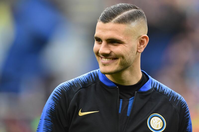 (FILES) This file photo taken on April 7, 2019 shows Inter Milan's Argentine forward Mauro Icardi smiling prior to the Italian Serie A football match Inter Milan vs Atalanta Bergamo at the San Siro stadium in Milan. Argentinian forward Mauro Icardi joins the PSG on loan for one year announced the parisian club on September 2, 2019. / AFP / Miguel MEDINA
