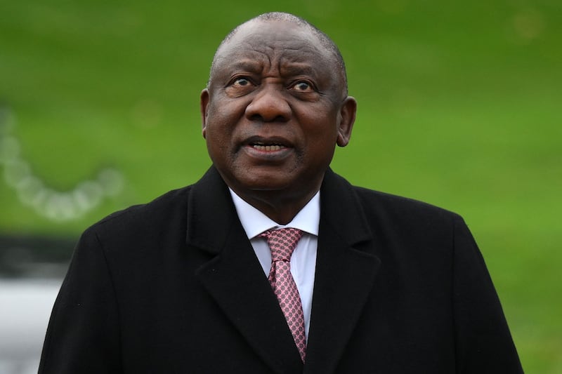 A spokesman for South Africa's President Cyril Ramaphosa, pictured above, said the leader would not resign on the basis of a 'flawed' report. AFP