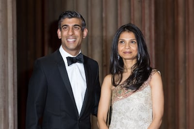 Britain’s Chancellor of the Exchequer Rishi Sunak and his wife Akshata Murty arrive for the British Asian Trust Reception in London on February 9.  EPA