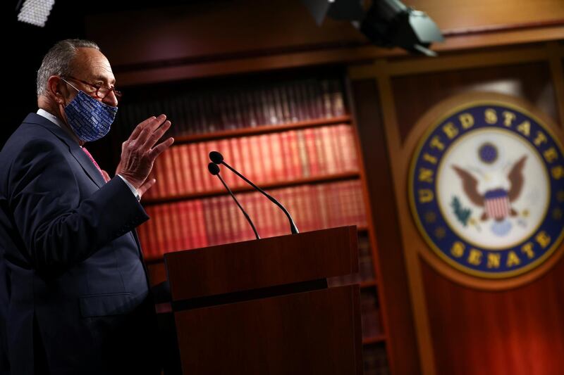 US Senate Minority Leader Chuck Schumer (D-NY) speaks to reporters about the results in the 2020 US presidential election, on Capitol Hill in Washington, DC. Reuters