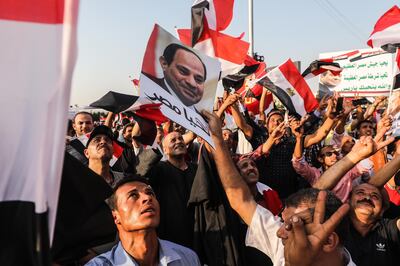 epa07874469 Supporters of Egyptian President Abdel Fattah al-Sisi during a rally in Cairo, Egypt, 27 September 2019. Egypt is preparing for a second ​weekend of protests in support and against the government of President al-Sisi.  EPA/Mohamed Hossam