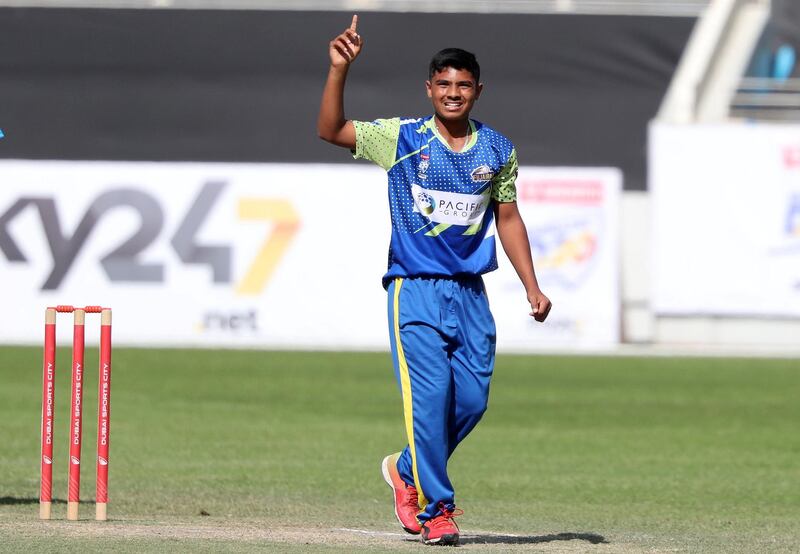 Dubai, United Arab Emirates - December 07, 2020: Cricket. Fujairah's Aayan Afzal Khan takes the wicket of Dubai's Ronak Panoly in the game between Dubai and Fujairah in the Emirates D20. Monday, December 7th, 2020 in Dubai. Chris Whiteoak / The National