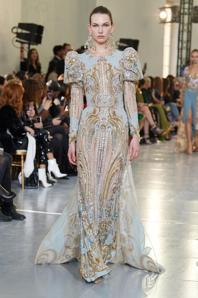 For spring haute couture 2020, Elie Saab created a dress using applique, with lace panels added on to to a sheer background. Courtesy Elie Saab