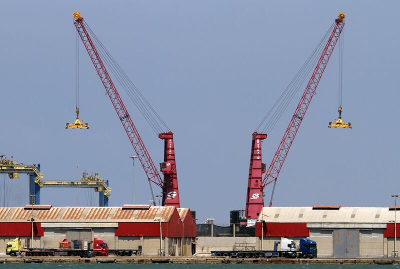 Loading cranes for trucks at Tripoli port in Lebanon. Reuters