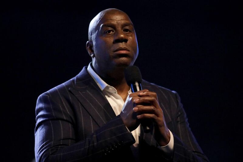 Magic Johnson speaks to the crowd before the All-Star Game. AFP