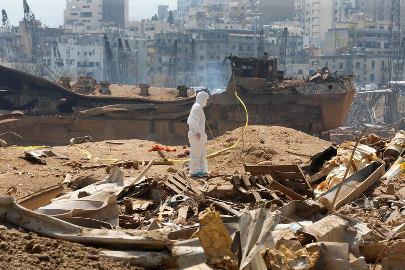 A forensic inspector walks on rubble at the site of Tuesday's blast, at Beirut's port area, Lebanon. Reuters