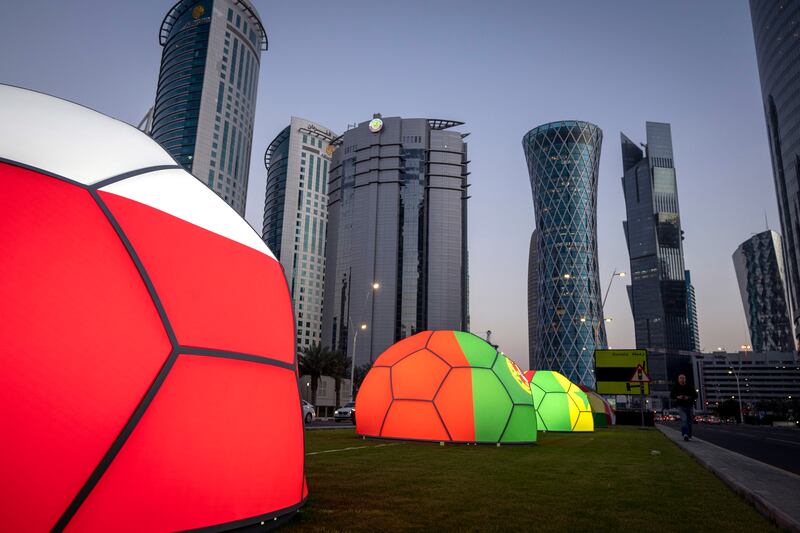 Domes featuring different national colors near the Doha Exhibition and Convention Centre. AP