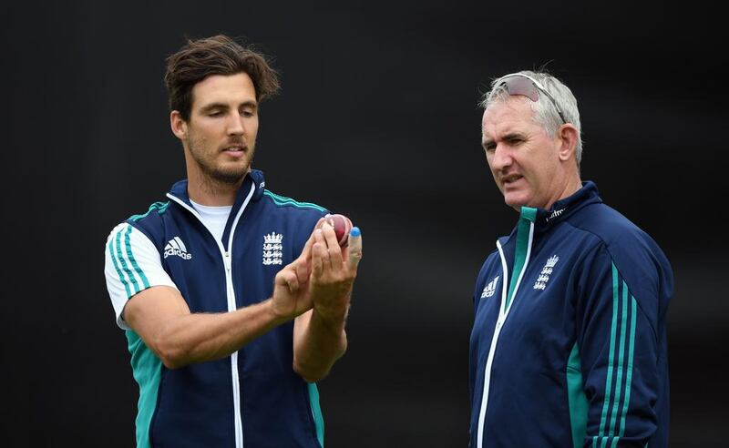 England bowler Steven Finn, left, chats with former fast bowler Andrew Caddick during a nets session in Birmingham. Stu Forster / Getty Images