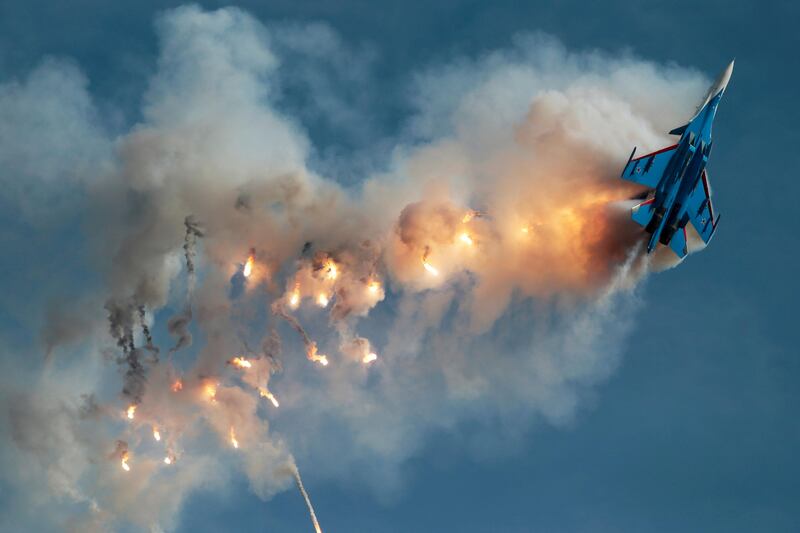 A Sukhoi Su-30SM fighter jet of the Russian Knights aerobatic team performs a stunt at an airbase outside Moscow. Andrey Volkov / Reuters
