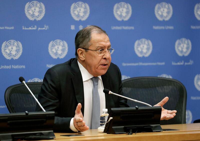 epa06454831 Russian Foreign Minister Sergei Lavrov (C) addresses the media at United Nations headquarters in New York, New York, USA, 19 January 2018.  EPA/JASON SZENES