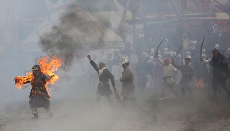 Participants perform during the Second World Nomad Games at Issyk-Kul lake in Cholpon-Ata, Kyrgyzstan. EPA