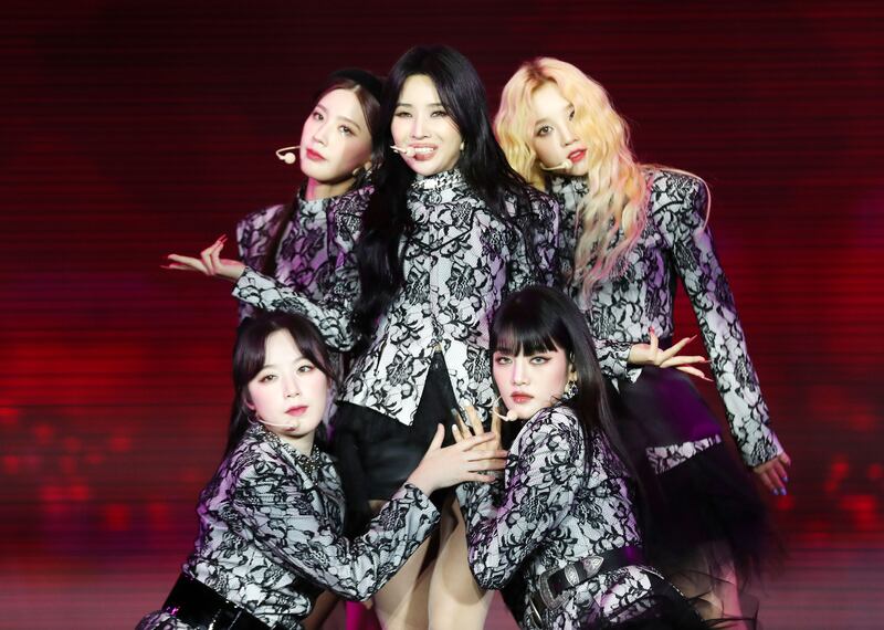 The members of (G)I-dle post on stage. Chris Whiteoak / The National