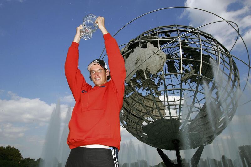 NEW YORK - SEPTEMBER 12:   Boy's Junior winner, Andrew Murray of Great Britain stands with his trophy during the US Open September 12, 2004 at the USTA National Tennis Center in Flushing Meadows Corona Park in the Flushing neighborhood of the Queens borough of New York.Murray defeated Sergiy Stakhovsky of the Ukraine.  (Photo by Matthew Stockman/Getty Images)
