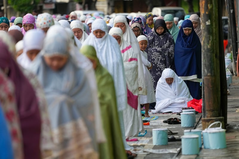 The faithful pray in Jakarta on Eid Al Adha. AP