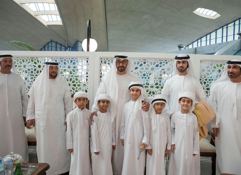 ABU DHABI, UNITED ARAB EMIRATES - July 18, 2017: HH Sheikh Mohamed bin Zayed Al Nahyan Crown Prince of Abu Dhabi Deputy Supreme Commander of the UAE Armed Forces (C) attends the wedding reception of Saeed Juma Al Ghuwais (2nd R), at Armed Forces Officers Club. Seen with HH Sheikh Mohamed bin Butti Al Hamed (2nd L) and Juma Al Ghuwais (R).

( Mohamed Al Hammadi / Crown Prince Court - Abu Dhabi )
---