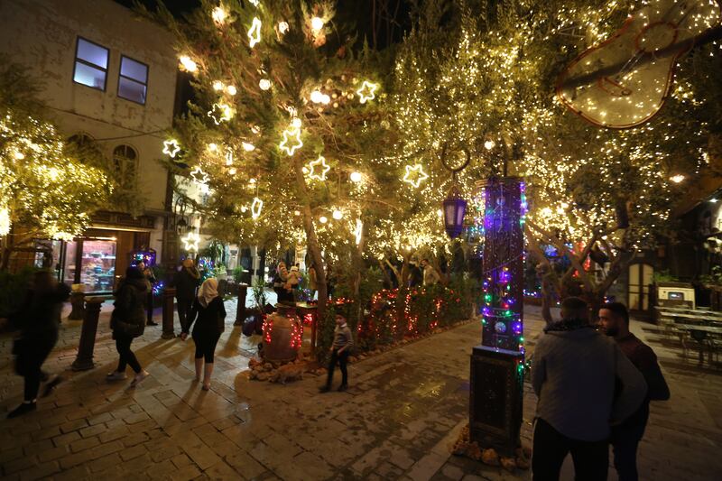 The streets of the Old City of Damascus are decorated with Christmas ornaments. EPA