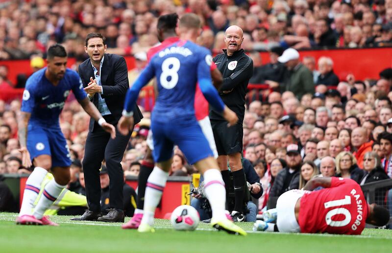 Lampard gestures from the touchline during the game. Getty