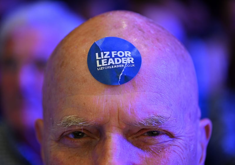 A supporter of Ms Truss at a Conservative Party hustings in Exeter, south-west England. Getty