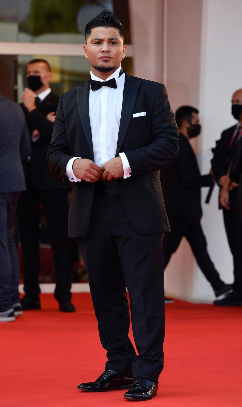 Lebanese-born actor Hussein Eliraqui arrives for the screening of 'Und Morgen Die Ganze Welt' at the 77th Venice Film Festival on September 10, 2020. AFP