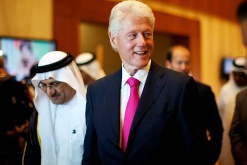 Former US President Bill Clinton leaves after officially opening the GEMS American Academy in Abu Dhabi, on December 13, 2011. 
Christopher Pike / The National

For story by: Afshan
Job ID: 64800