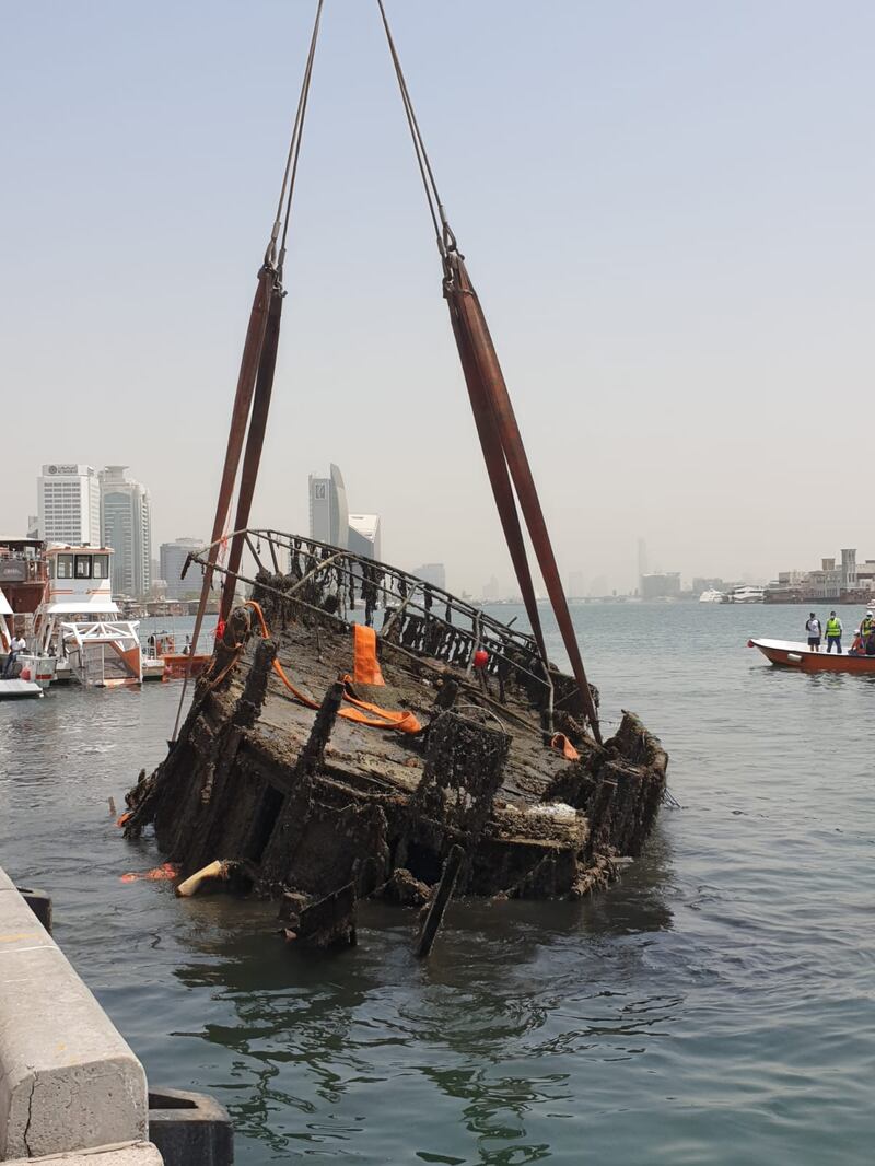 Another shipwreck is salvaged from Dubai Creek. Photo: Dubai Municipality