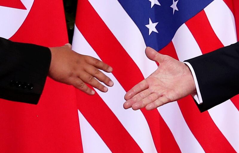 US president Donald Trump shakes hands with North Korean leader Kim Jong-un at the Capella Hotel on Sentosa island in Singapore. Jonathan Ernst / Reuters