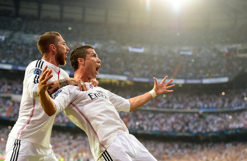 Cristiano Ronaldo celebrates with Sergio Ramos after scoring for Real Madrid during the Champions League semi-final second-leg at home to Juventus on May 13, 2015. AFP