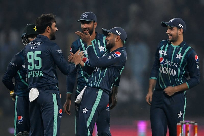Pakistan's players celebrate after the dismissal of England's Dawid Malan in Lahore. AFP