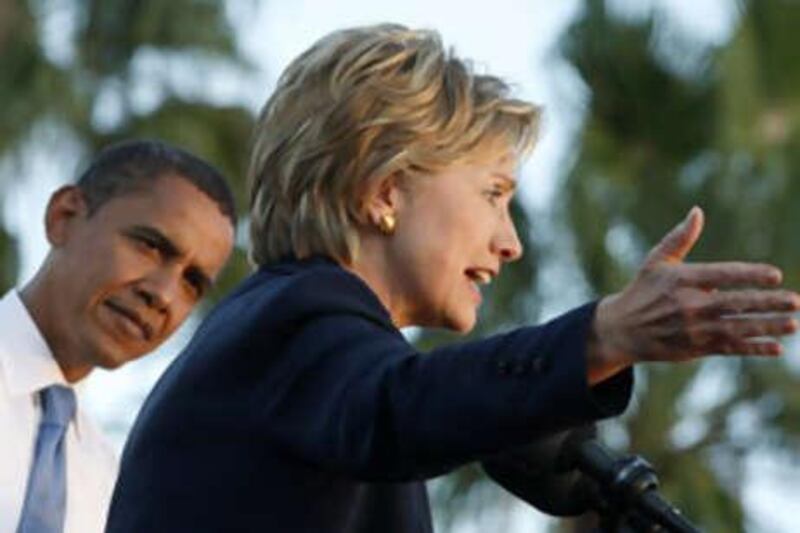 The US President-elect Barack Obama and Senator Hillary Clinton attend a campaign rally in Orlando, Florida, on Oct 20 2008. Mr Obama is said to be considering Mrs Clinton for the position of secretary of state.